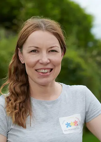 Karen Simpson of My Primary Tutor standing outside